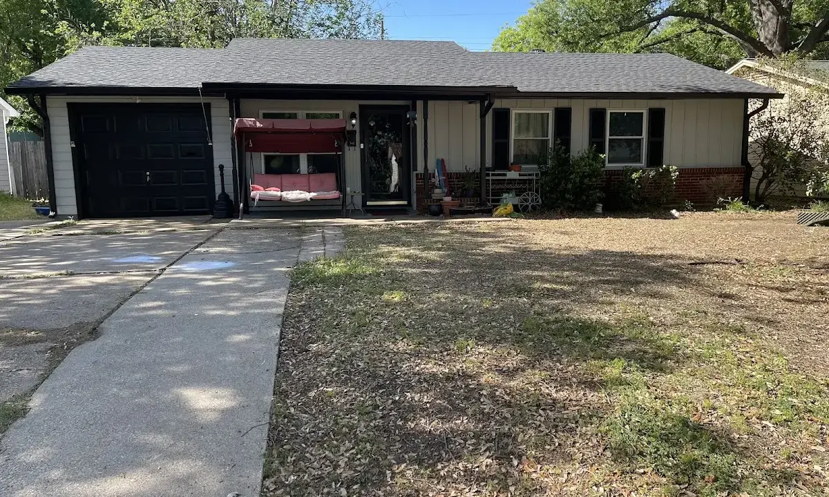 Asphalt Shingle Roof Repair crew at work on a residential roof in High Point
